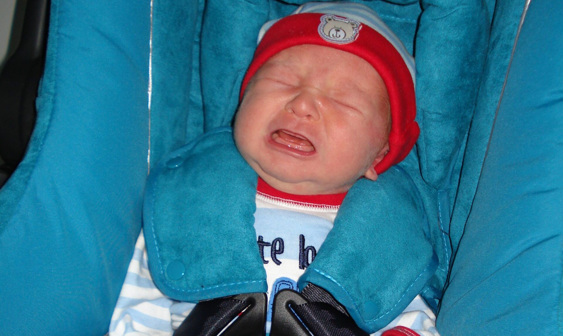baby crying in car seat